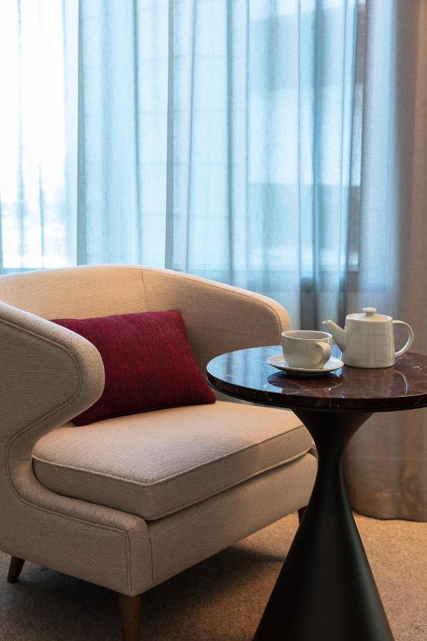 Next Hotel Melbourne, Curio Collection By Hilton Esterno foto A tea set