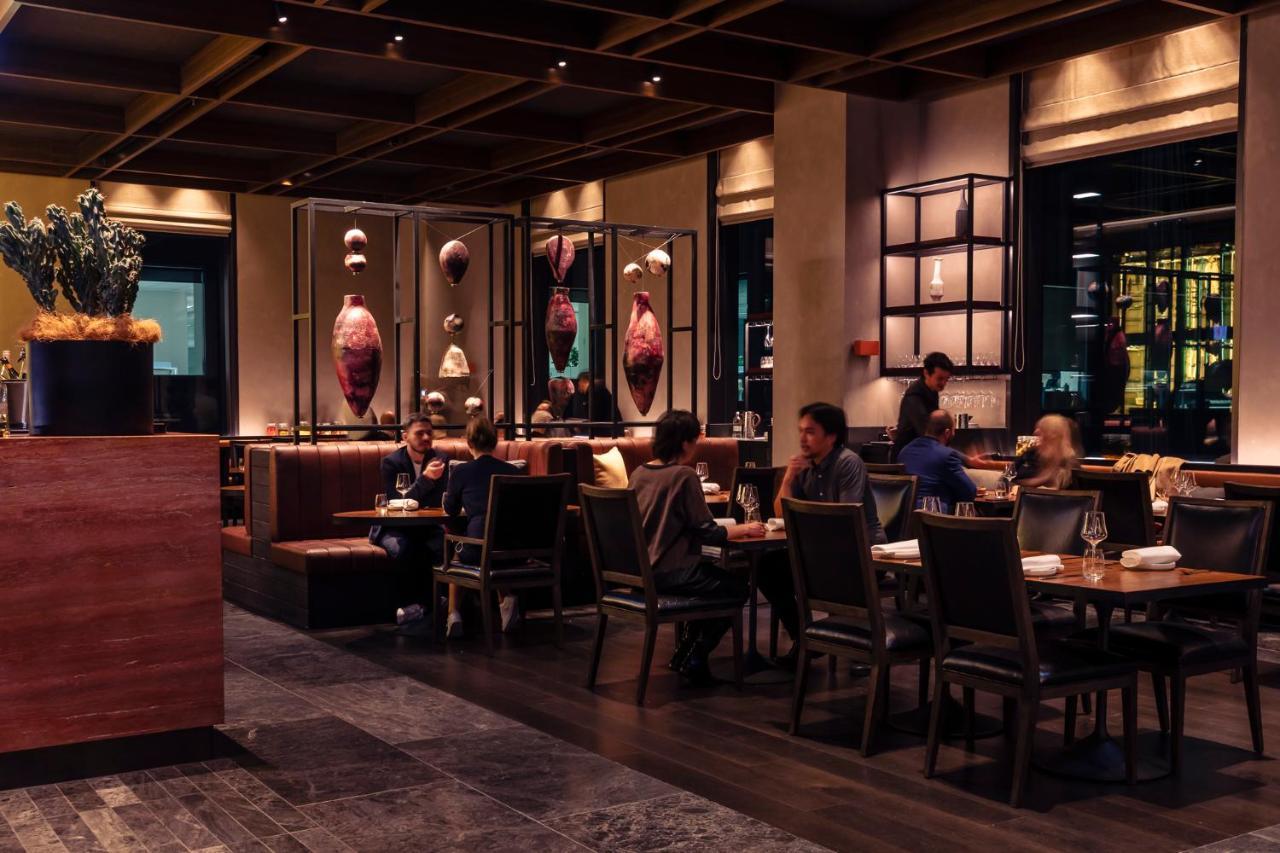 Next Hotel Melbourne, Curio Collection By Hilton Esterno foto Interior of a restaurant in Hong Kong