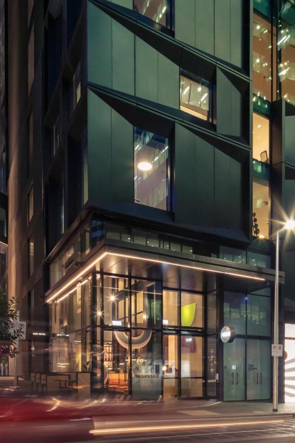 Next Hotel Melbourne, Curio Collection By Hilton Esterno foto The entrance to the hotel